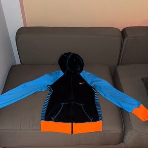 Nike Hoodie in Black with Blue Sleeves and Orange Trim